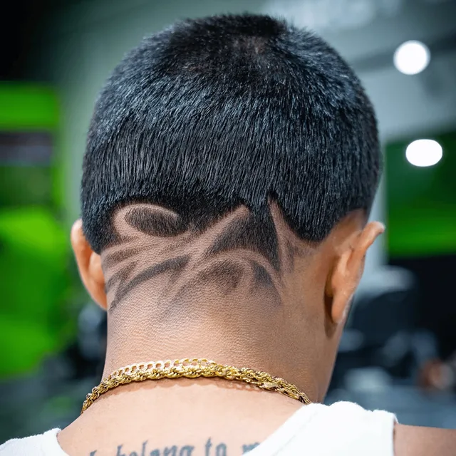 Custom hair design at Blades Vision Barbershop in Houston, TX