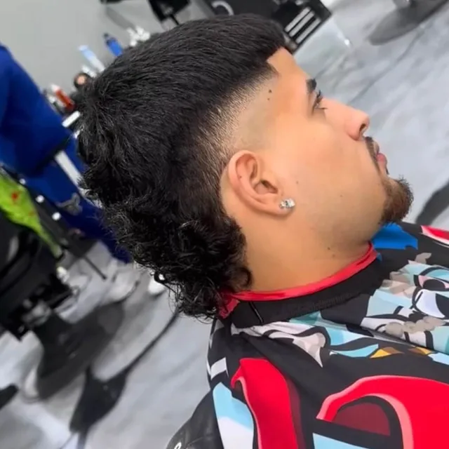Fade haircut at Blades Vision Barbershop in Houston, TX